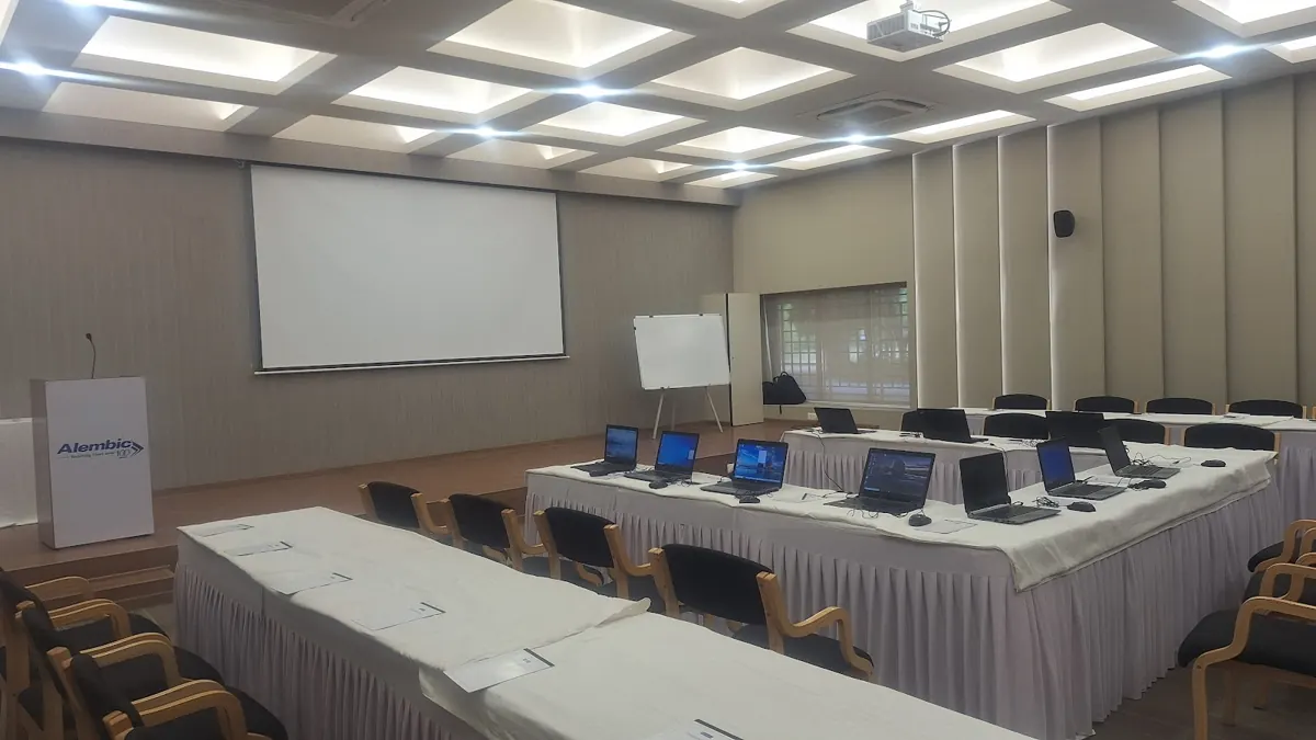 Training room set up with rental laptops on every desk
